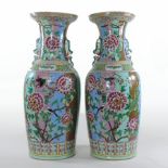 A pair of large 19th century Chinese porcelain vases, each of baluster shape,