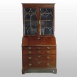 A George III mahogany bureau bookcase,