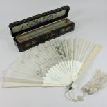 A 19th century Chinese Canton carved ivory and silk embroidered fan,