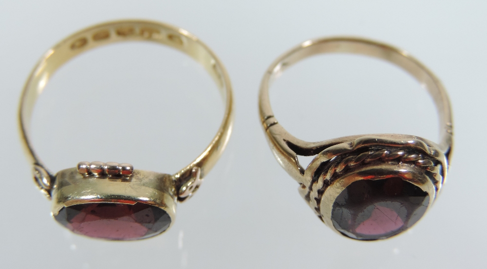 A Victorian 22 carat gold and garnet set ring, London 1871, - Image 6 of 6