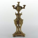 An Italian style carved limewood three branch table candelabra,