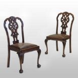 A set of four early 20th century carved mahogany dining chairs, of 18th century design,