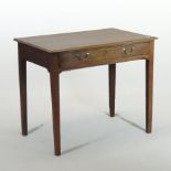 An 18th century oak side table, the frieze containing a single drawer, on square tapered legs,