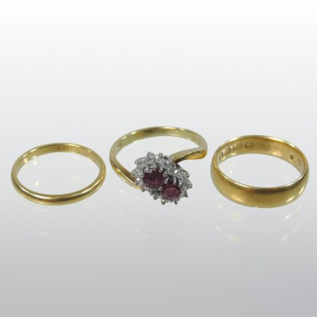 A 22 carat gold wedding band,