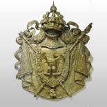 A 19th century carved pine and gilt gesso framed coat of arms,