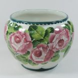 A 19th century Wemyss pottery jardiniere, painted with cabbage roses, retailed by T.