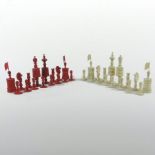 A 19th century Chinese carved bone chess set,