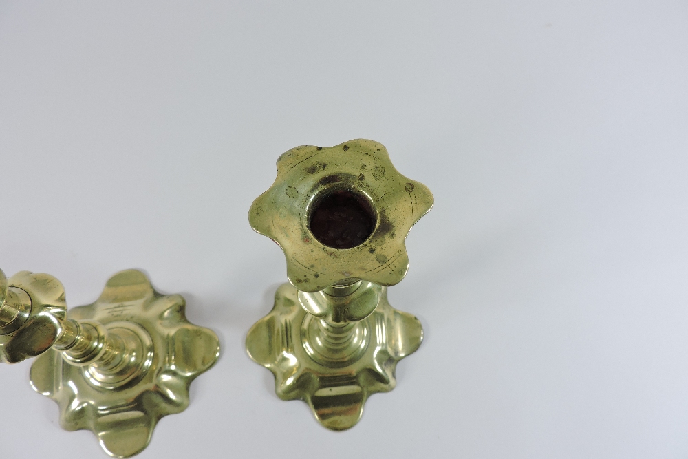 A pair of 18th century brass candlesticks, with petal shaped bases, - Image 7 of 8