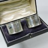 A pair of Edwardian silver napkin rings, Sheffield 1910,