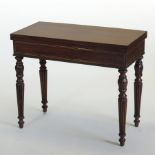 A Regency rosewood and cut brass inlaid folding card table, with a hinged rectangular top,