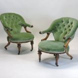 A pair of Victorian mahogany green upholstered button back armchairs