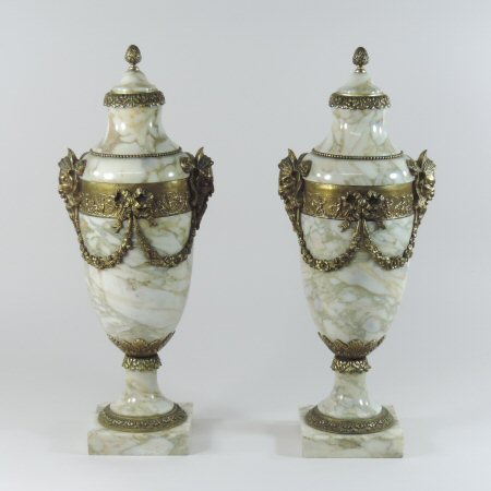 A pair of gilt bronze mounted white marble cassolettes, each of urn shape,