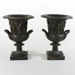 A pair of bronze Borghese urn shaped vases, after the antique, each relief decorated with figures,