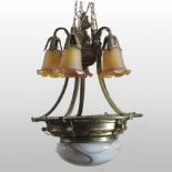 An ornate 1920's gilt metal and marbled glass ceiling light,