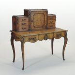 A 19th century French walnut and gilt metal mounted bonheur du jour,