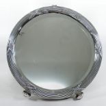 An early 20th century silver framed circular easel mirror, London 1927,