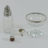 A George III silver mounted glass caster, with a pierced removable cover, London 1818, 14cm high,