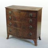 A Regency mahogany bow front chest, containing four long graduated drawers, on swept bracket feet,