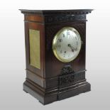 An early 20th century mahogany cased mantel clock, the silvered dial with Arabic hours,