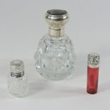 An Edwardian cut glass scent bottle, with a silver and tortoiseshell lid, London 1905, 13cm high,