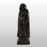 An early 20th century bronze figure of a woman, signed Kavel Laloo to the base,