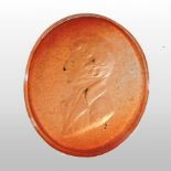 A 19th century carved cornelian intaglio seal,