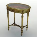 A 19th century French carved and gilt wood bijouterie table, of oval shape,