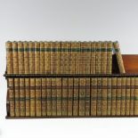 A collection of leather bound books, to include Sir Walter Scott's The Waverley Novels,