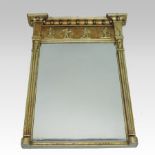 A Regency carved pine and gilt gesso framed pier mirror, with ball ornament,