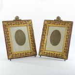 A pair of ornate 19th century gilt metal mounted photograph frames, stamped Newey,