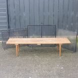 A 1970's slatted hardwood table,