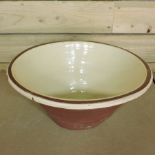 A terracotta proving bowl,