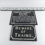 A painted metal Beware of Train sign,