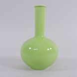 A green overlaid Peking style glass bottle vase,