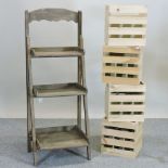 A set of wooden folding graduated shelves,