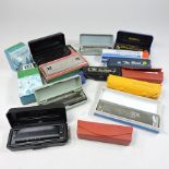A collection of various harmonicas,