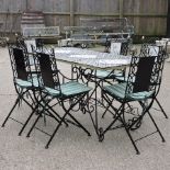 A cast iron garden table, 140 x 76cm,