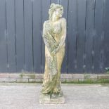 A Haddon stone garden figure of a young lady,