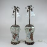 A pair of Chinese vases, converted to table lamps,