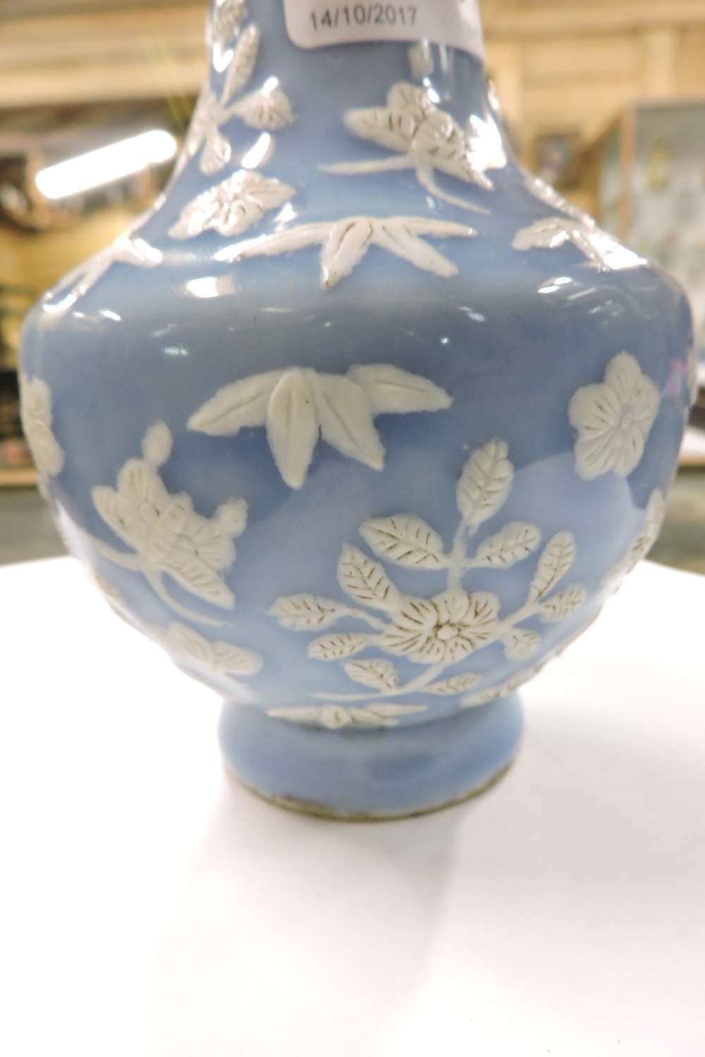 A Chinese blue and white porcelain vase, relief decorated with flowers, character marks to base, - Image 2 of 5