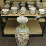 A Japanese porcelain part dinner service, together with a large Chinese porcelain vase,