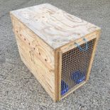 A wooden pet transportation box,