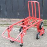 A red metal folding trolley