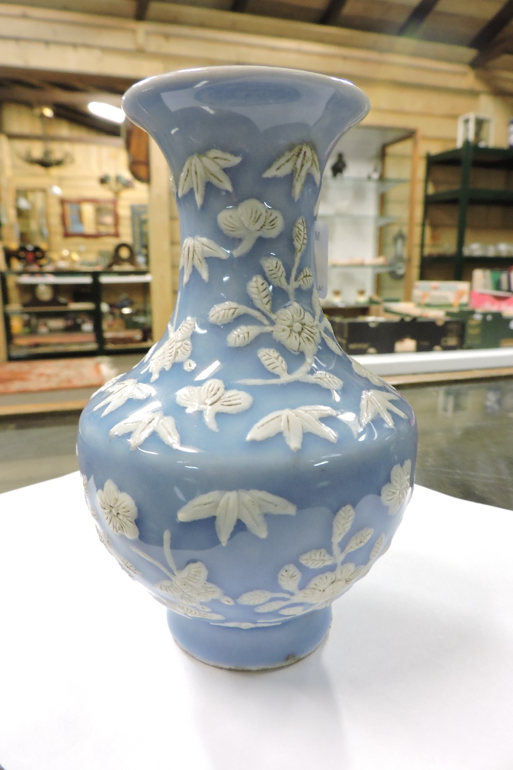 A Chinese blue and white porcelain vase, relief decorated with flowers, character marks to base, - Image 3 of 5