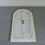 A white painted wooden arched shutter wall mirror,