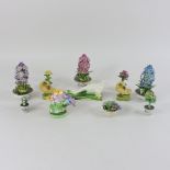 A collection of continental porcelain models of hyacinths and flowers, tallest 12cm,