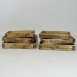 A set of three wooden Harrods advertising trays,
