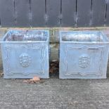 A pair of lead planters,