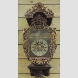 A 19th century style Dutch ornately carved and decorated wall clock,