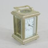 A reproduction miniature carriage clock,